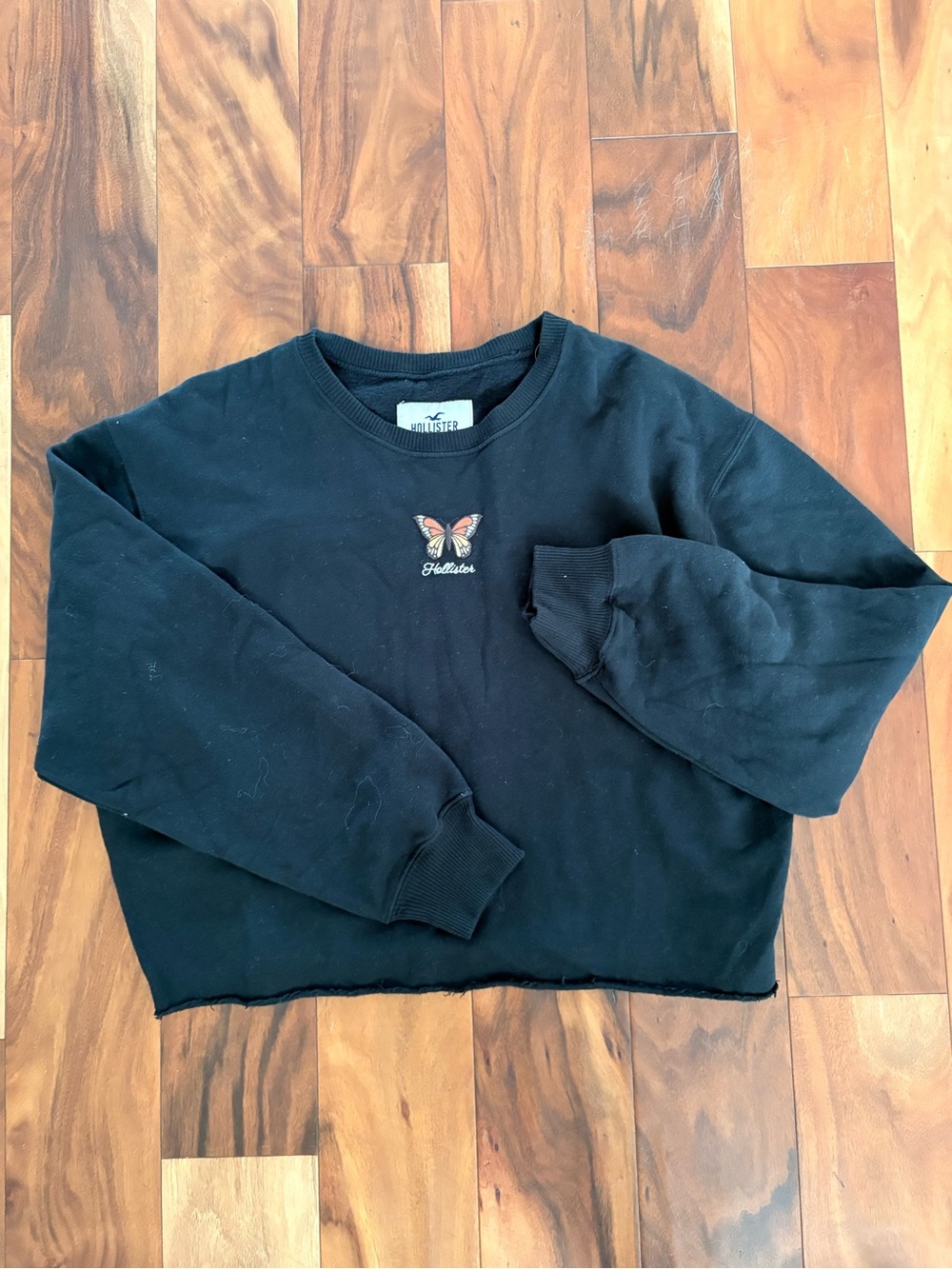 Hollister Black Crewneck Sweatshirt with Embroidered Butterfly